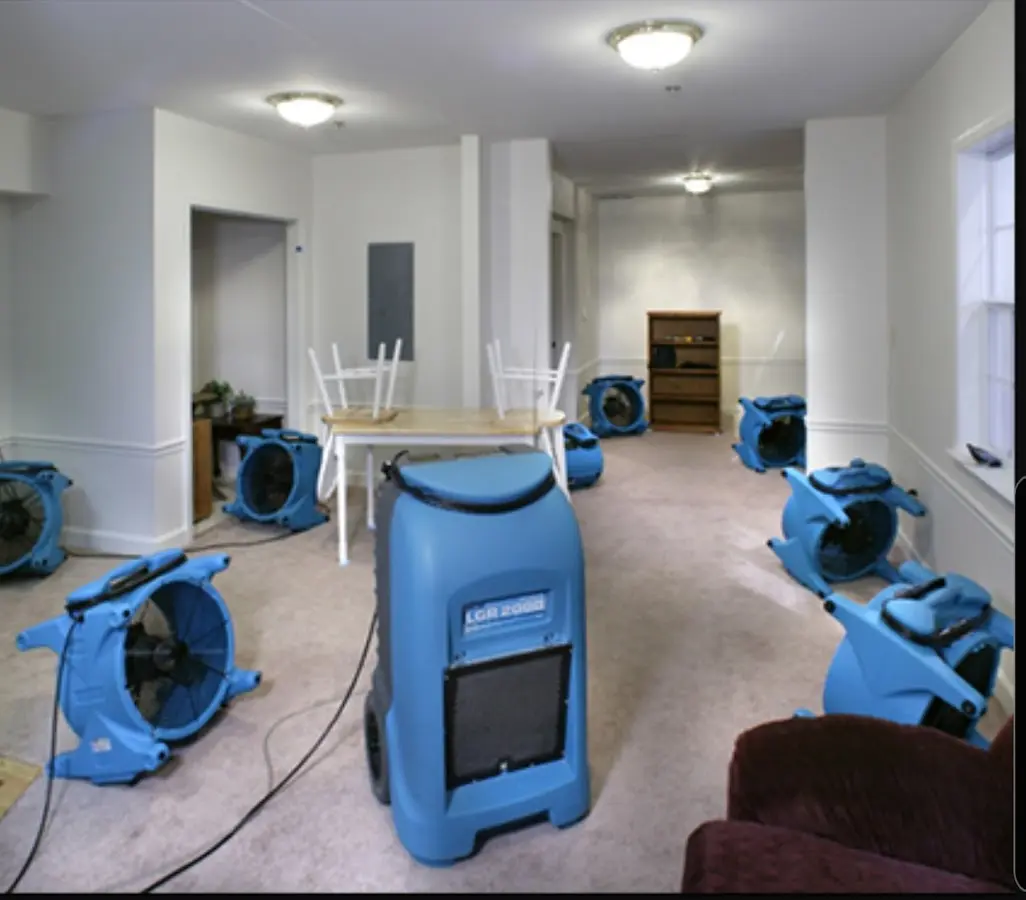 Air movers and dehumidifier setup for Water Extraction & Removal in Keene